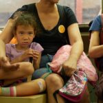 portrait of a little girl on the subway in New York